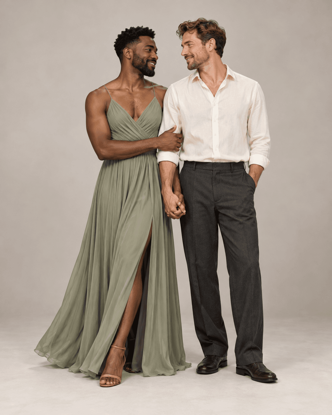 AI-generated full-length studio concept of two fictional adults: Person A wears a flowing sage dress; Person B wears a cream shirt and charcoal relaxed trousers.